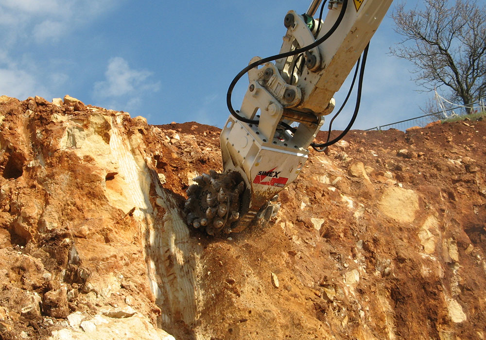Simex twin header rock grinder in quarry