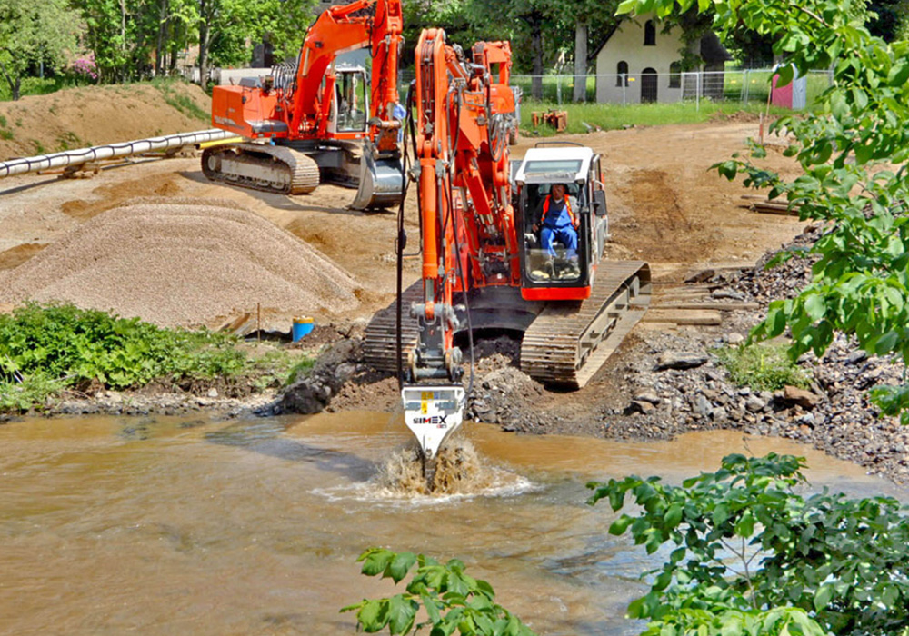 Simex twin header rock grinder in under water work